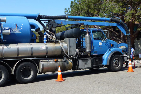 Big Blue Truck Cleans Drains