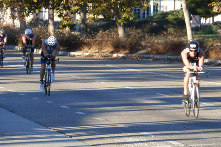 Triathlon Bikers Race Thru Venice