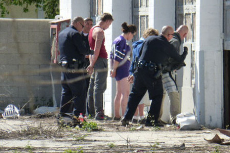Police Apprehend Yard Sitters