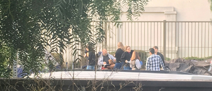 Pardue Captures Group Talking with Homeless...